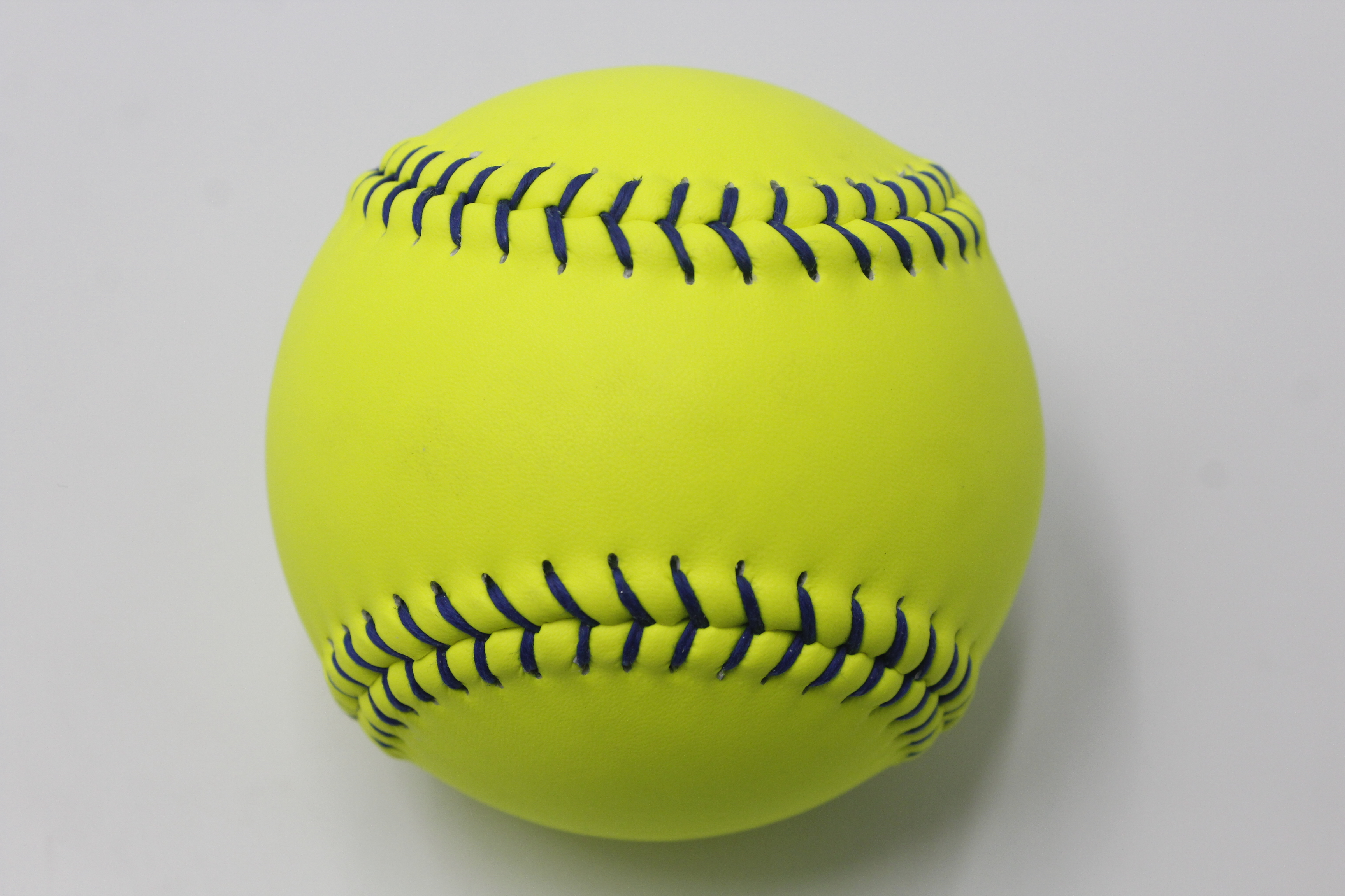 Fabrikpreis 11/12 Zoll Wicked Softball-Lederbezug Poly Core Blaue Nähte .47 Cor 375 LBS Kompression 12er-Pack USSSA Classic Fastpitch